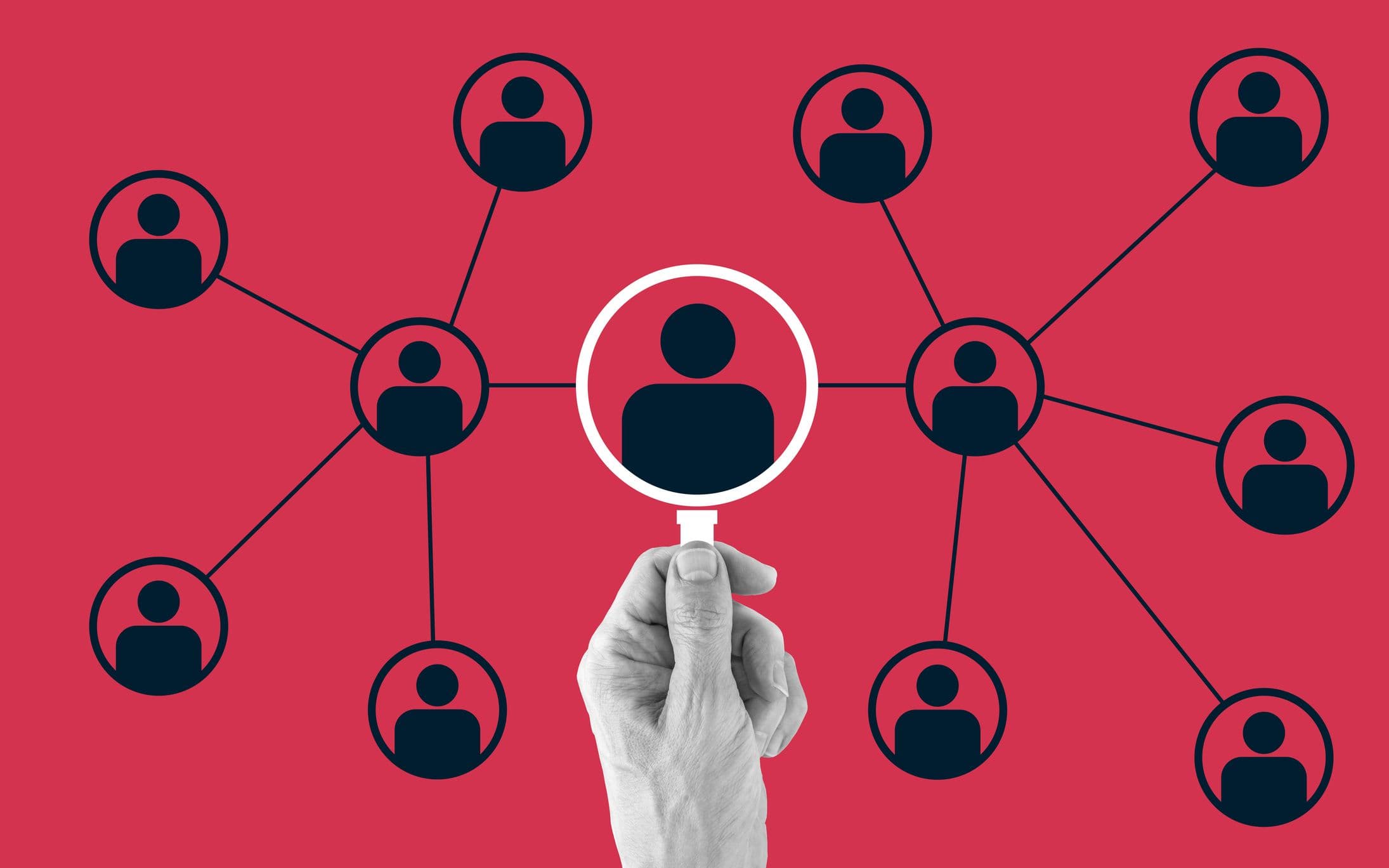 A human hand holds an illustrated magnifying glass over a human icon on a red network diagram.