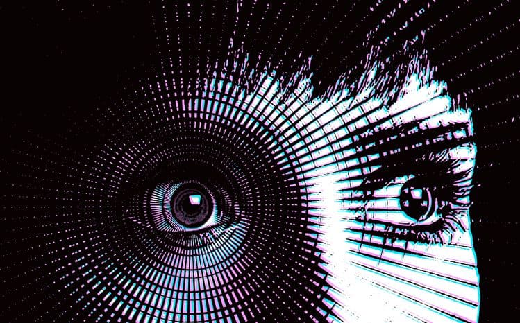 A closeup of a woman's eyes, open wide, watching something intensely, with a circular graph pattern over one eye.