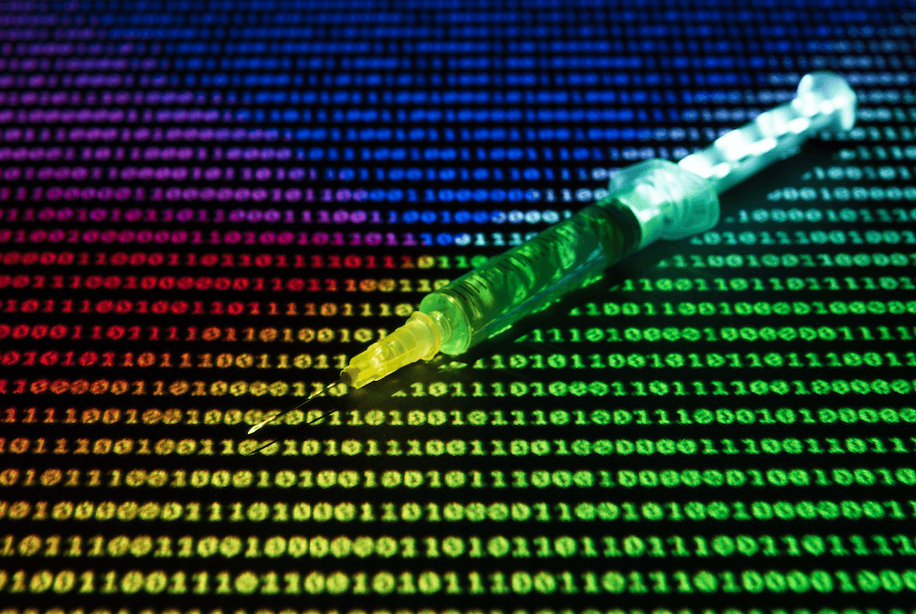 An image of a hypodermic needle sitting atop a spread of neon-bright ones and zeros.