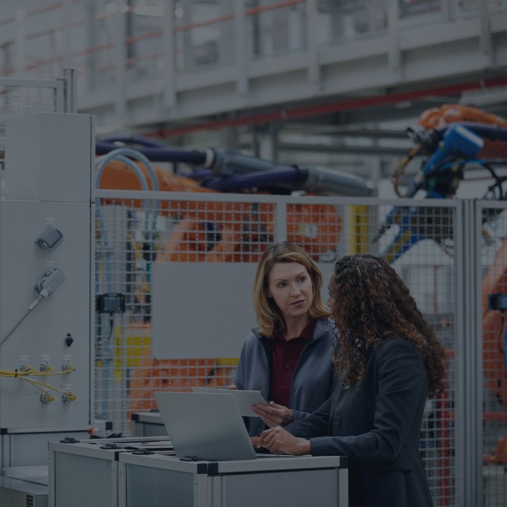 Two people in warehouse