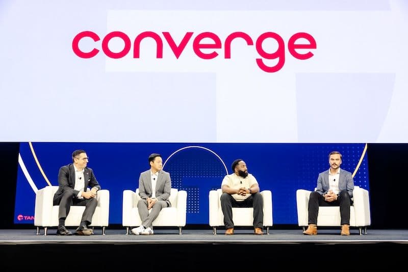 Converge 2025 Tanium CCO Russ Slaten and customers