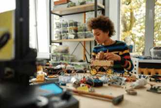 Child working with toy building blocks at a table with shelving in background