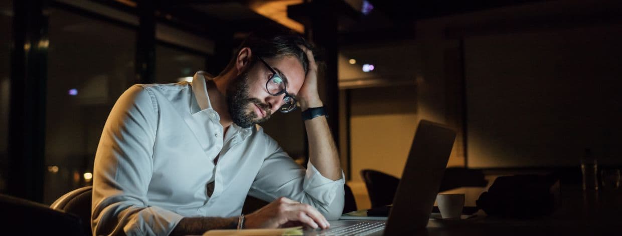 Man looking at computer screen