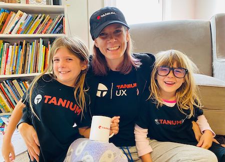 Erika (center) at home with her two children.